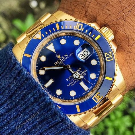 Rolex gold submariner blue face